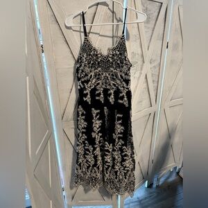 Express black dress with cream embroidery
